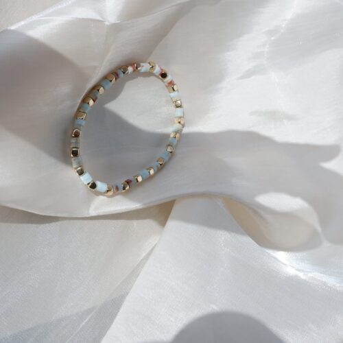 The Terra Oasis Beaded Bracelet on cloth