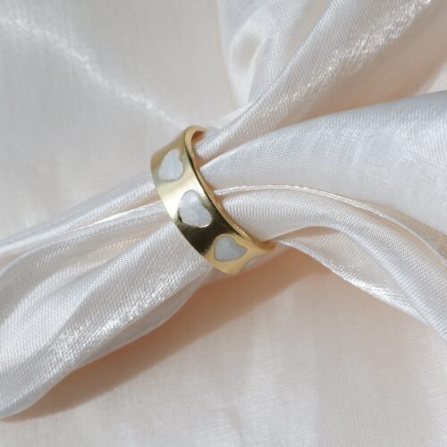 The Pearl White Inlay Band on silk background