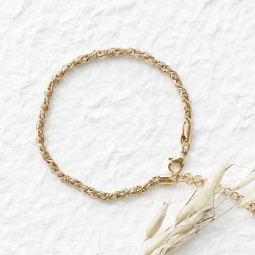 The Heritage Rope Chain Bracelet on a plaster background