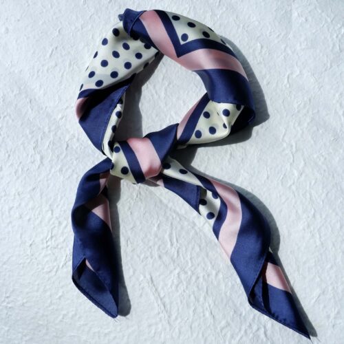 etro Navy Dot Scarf with Pink Border on a plaster background
