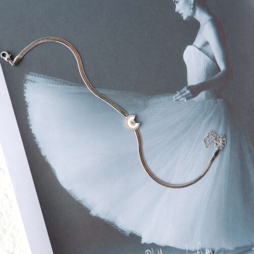 ballerina wearing Floating Crystal Moon Ankle Bracelet