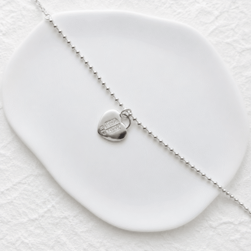 Y2K Silver Ball Chain Heart Bracelet on a white background