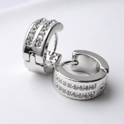 Chunky Silver Double Row Pavé Huggie Earrings on a white background