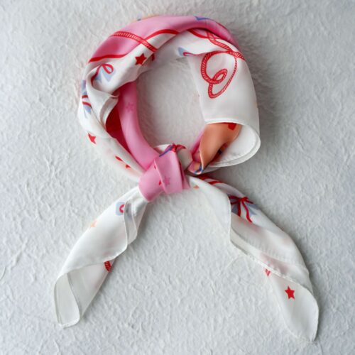 Pink Western Cowgirl Silk Scarf with Hearts & Roses on a plastered background